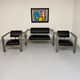 Brutalist living room with faux metal armchairs designed by Karl Friedrich Forster