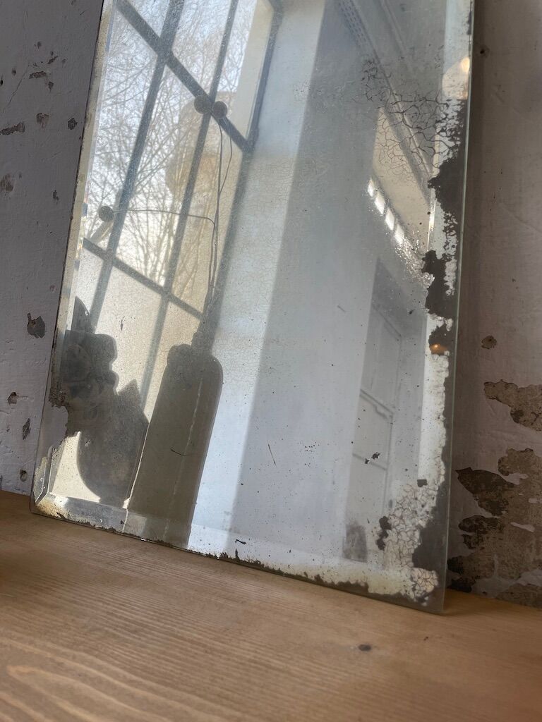 Very stung old bevelled mirror 39x60cm