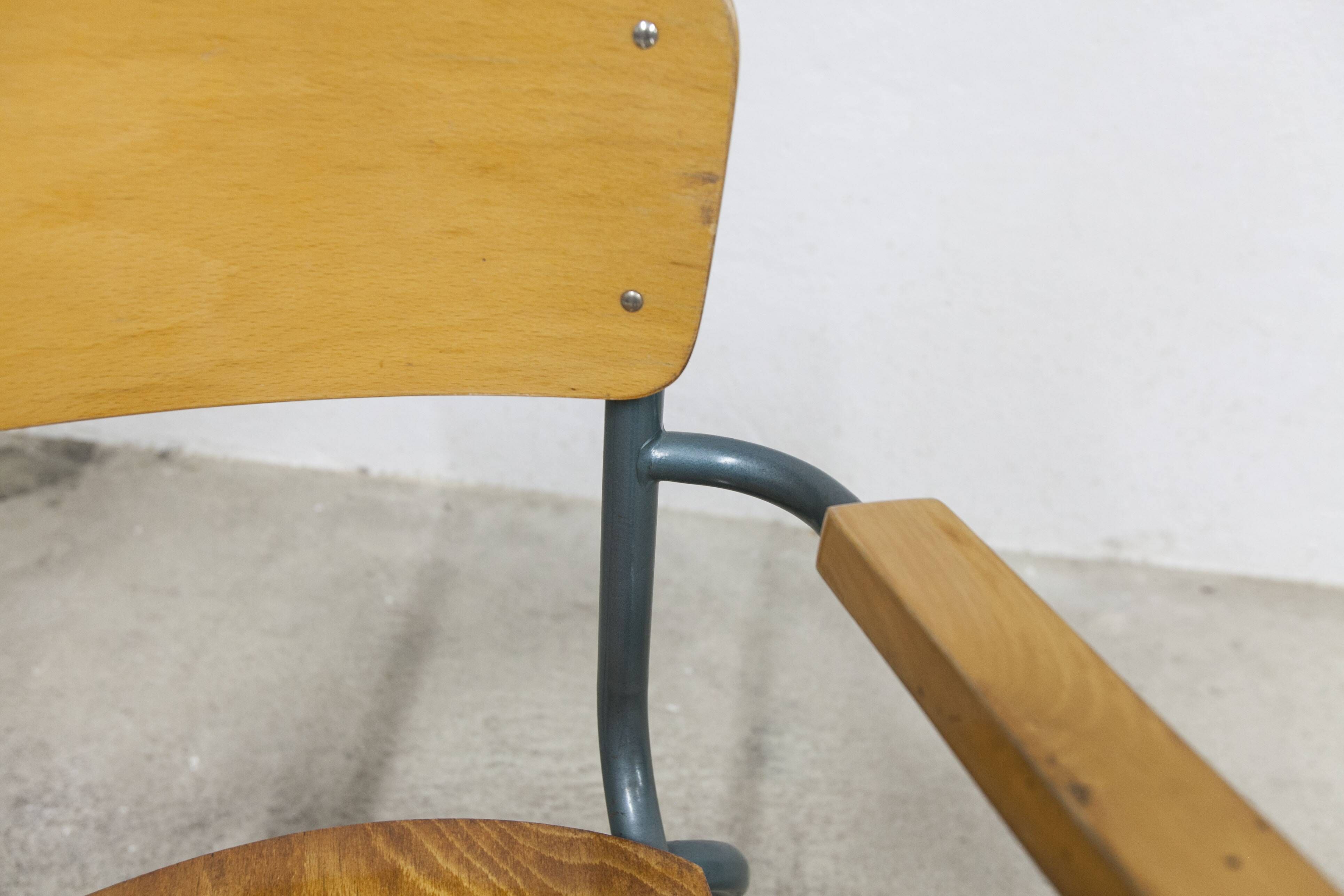 1962 school teacher's chair in honey color and tubular structure