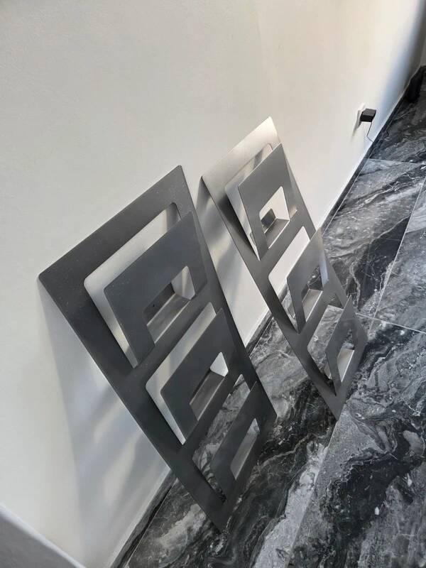 2 vintage magazine racks from the 2000s, minimalist design