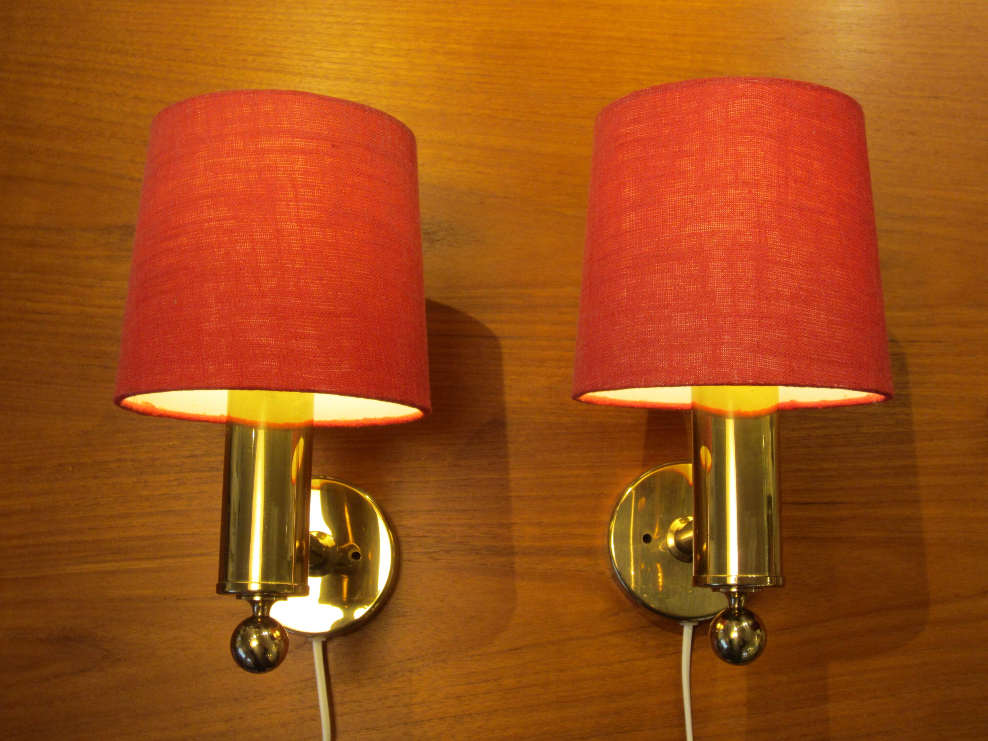 Pair of golden Scandinavian wall lights by Bergboms