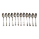 12 small Christofle Marly silver-plated spoons in the mascaron pattern.