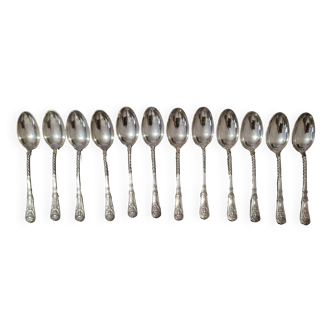 12 small Christofle Marly silver-plated teaspoons in the mascaron pattern.