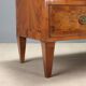 Neoclassical commode in walnut and burl.