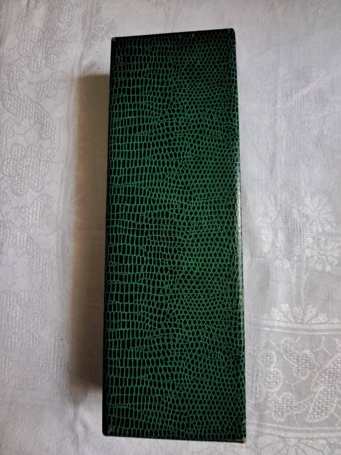 Silver metal cake peeler.