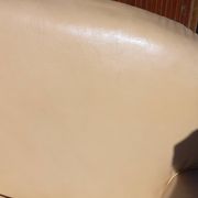 Pair of 1930s club armchairs in ivory leather.