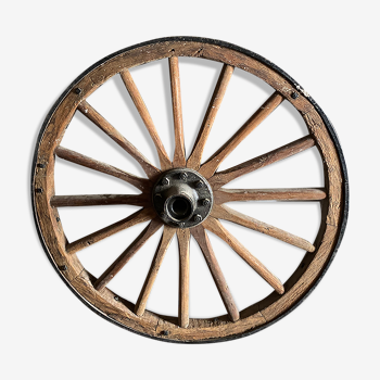 Wheel of wooden and cast iron cart