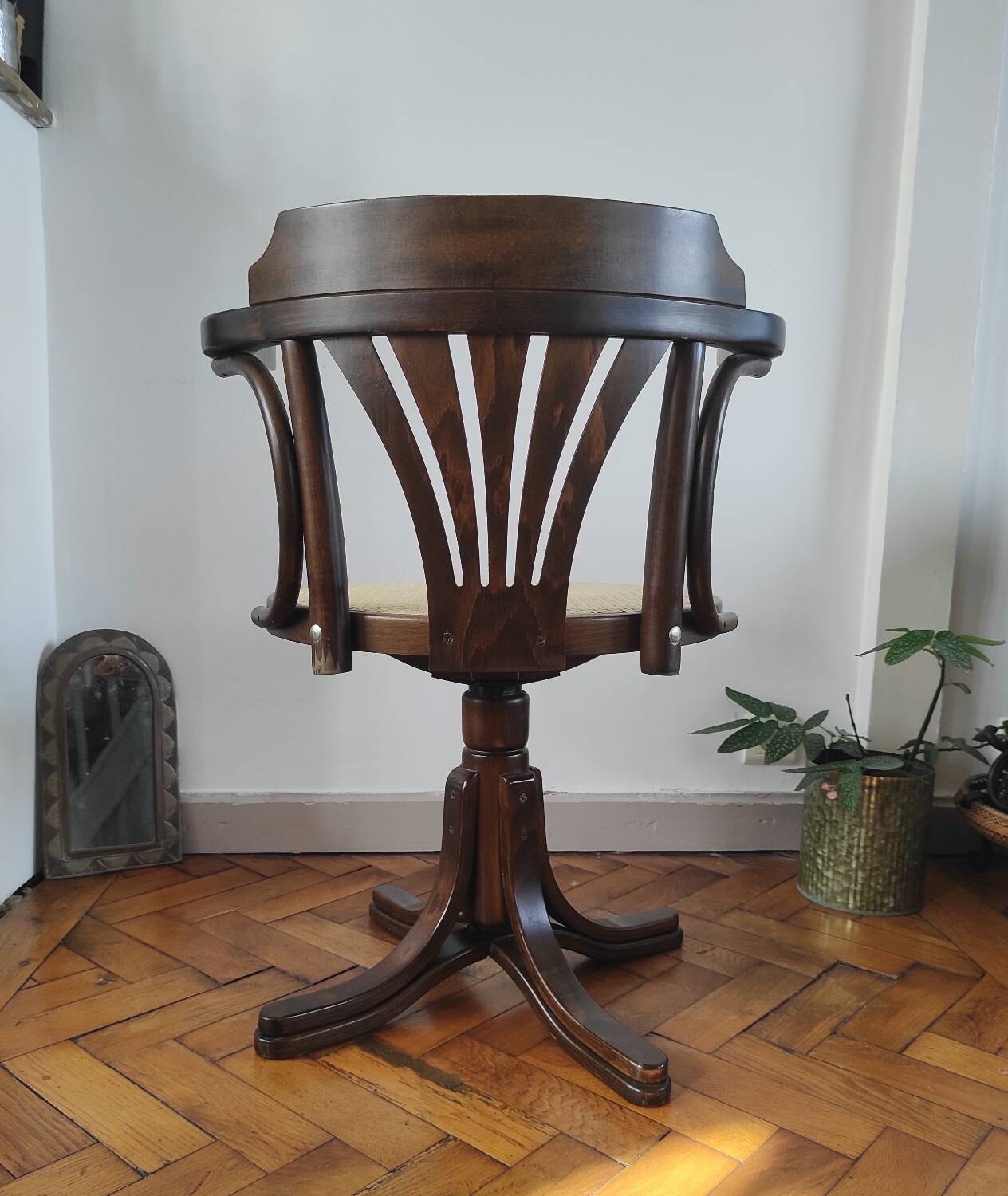 Vintage swivel office chair with curved wood and caning (Thonet style)