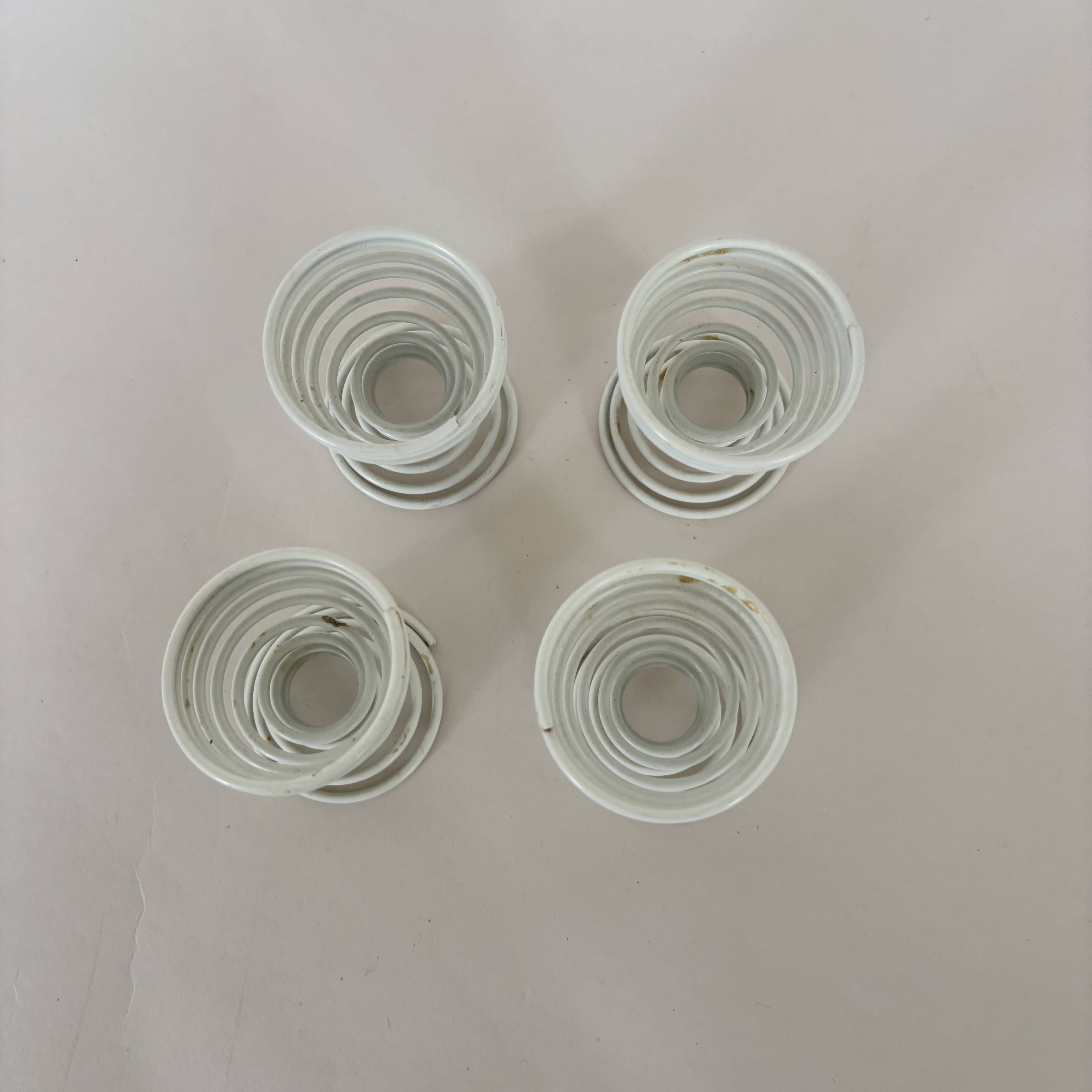 Set of 4 white spiral egg cups