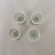 Set of 4 white spiral egg cups
