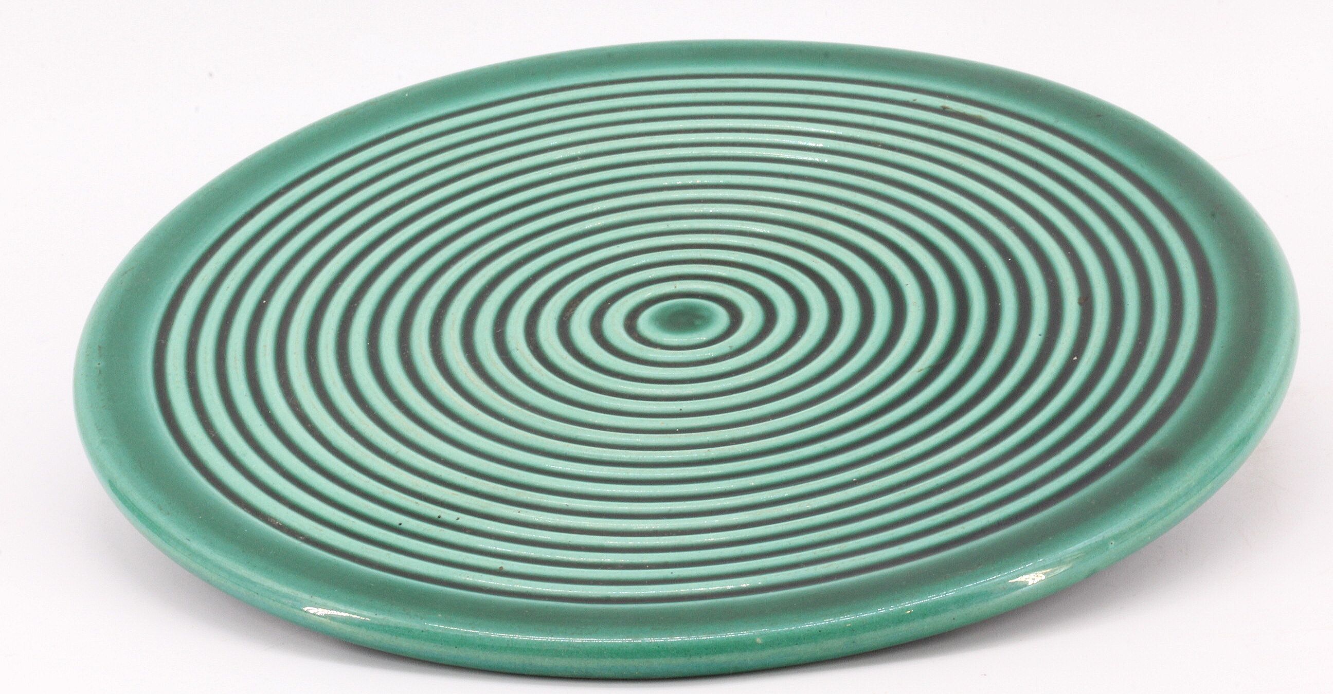 Under the plate and under ceramic bottles