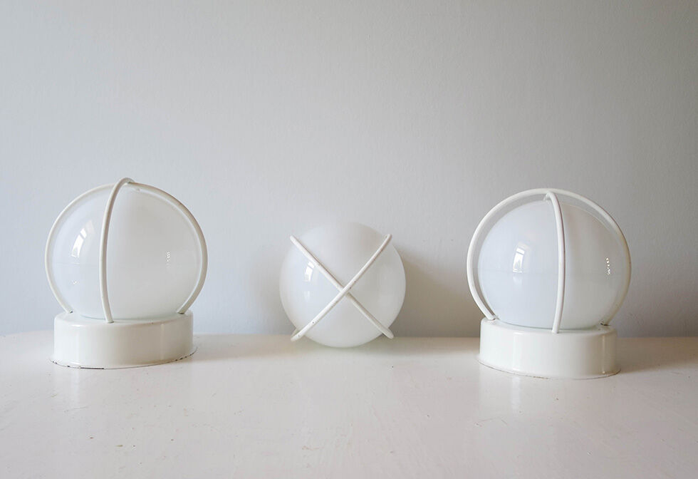 Lot of three globe wall sconces