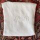 Old tablecloth in white cotton and monogram