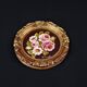 Still life in Tondo oil on panel of a bouquet of pink roses signed