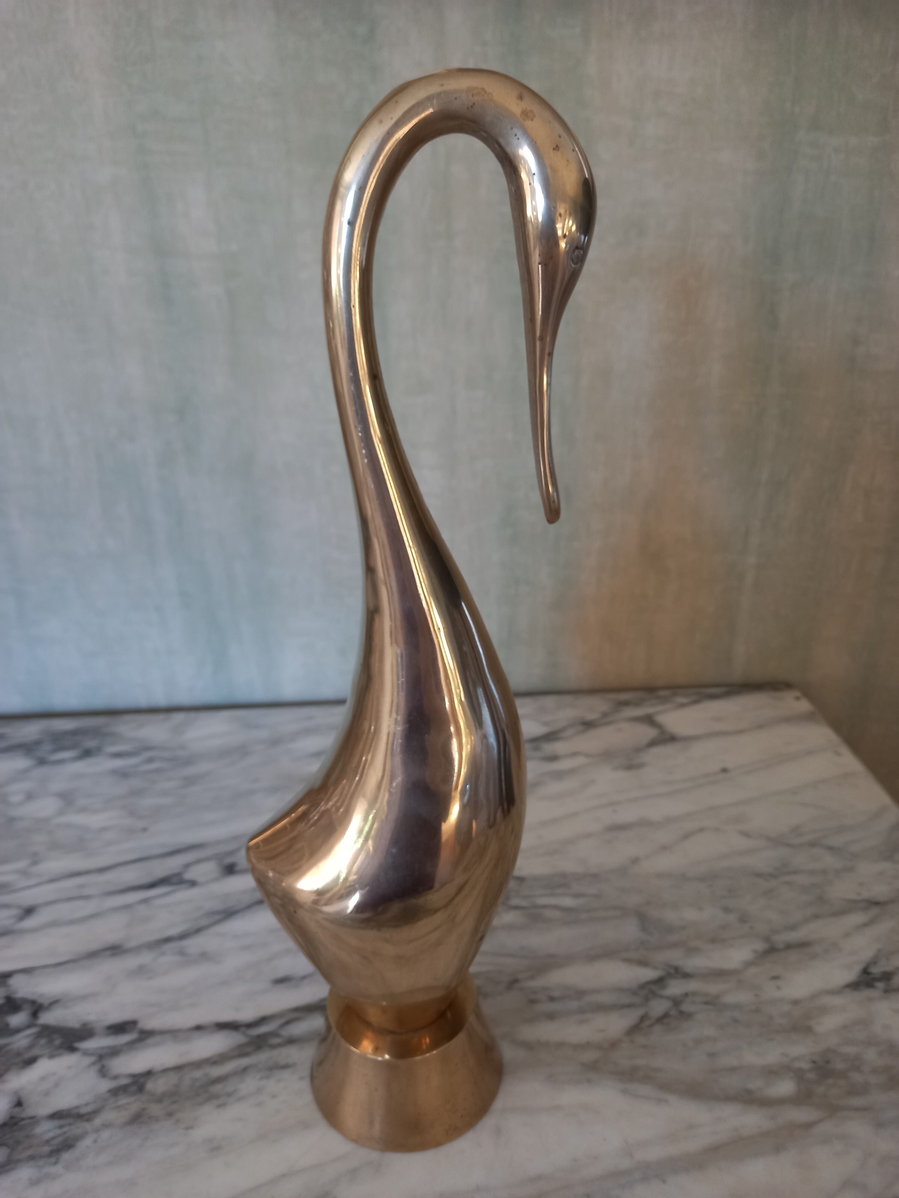 Brass heron