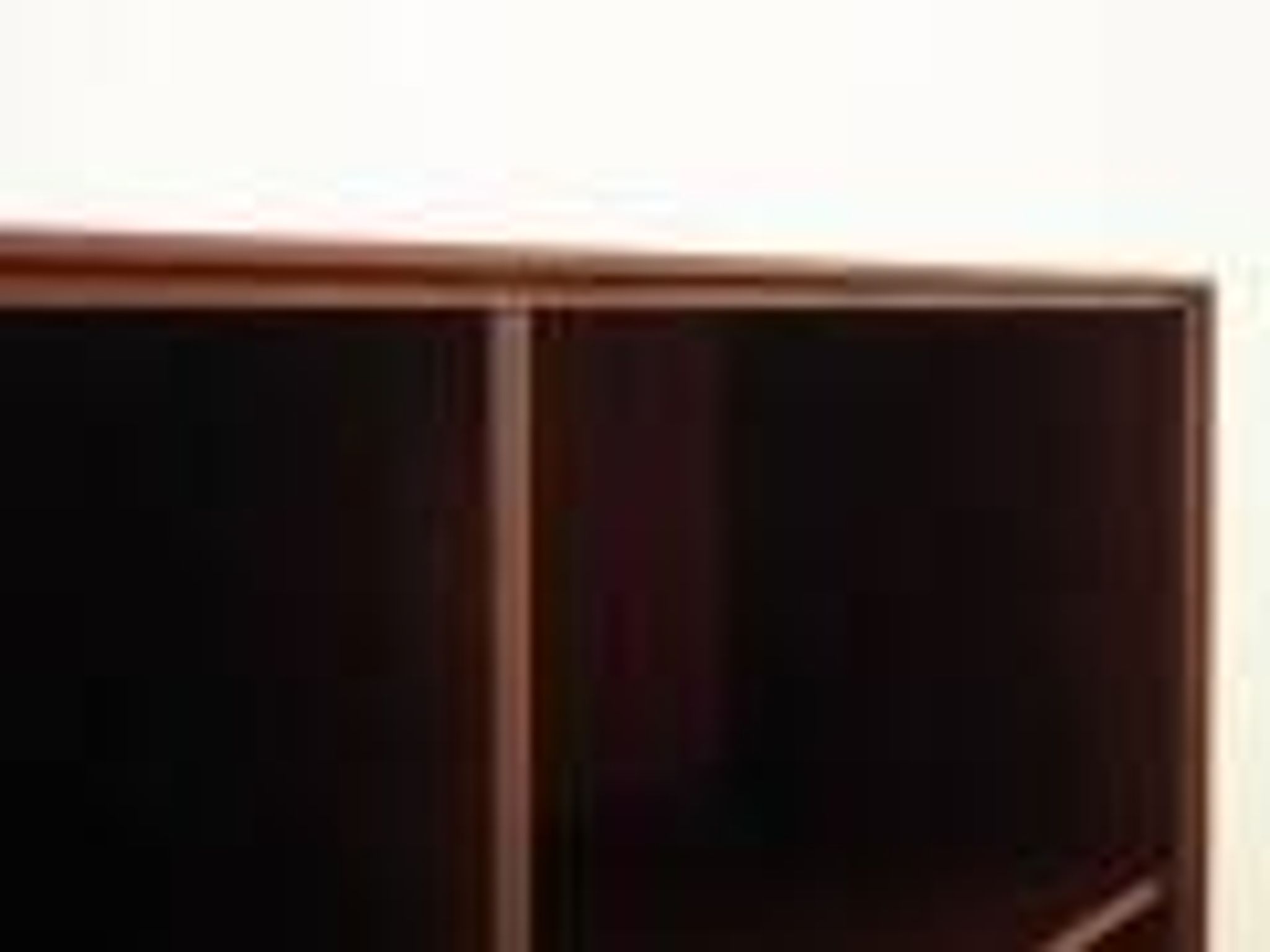 Danish mahogany veneered shelving unit on splayed legs, 1960s