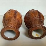 Pair of small woven vases in wicker rattan straw