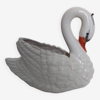 ceramic pot cover in the shape of a swan