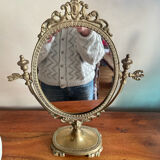 Swivelling brass mirror