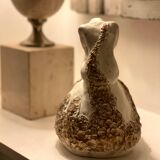 Signed plaster statuette