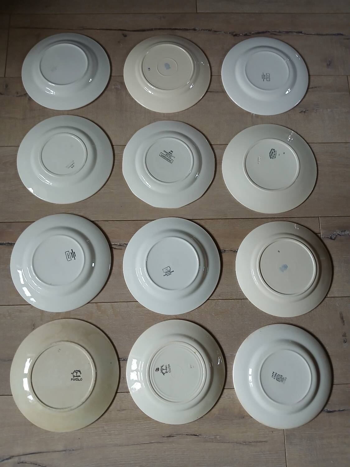 12 mismatched antique dinner plates
