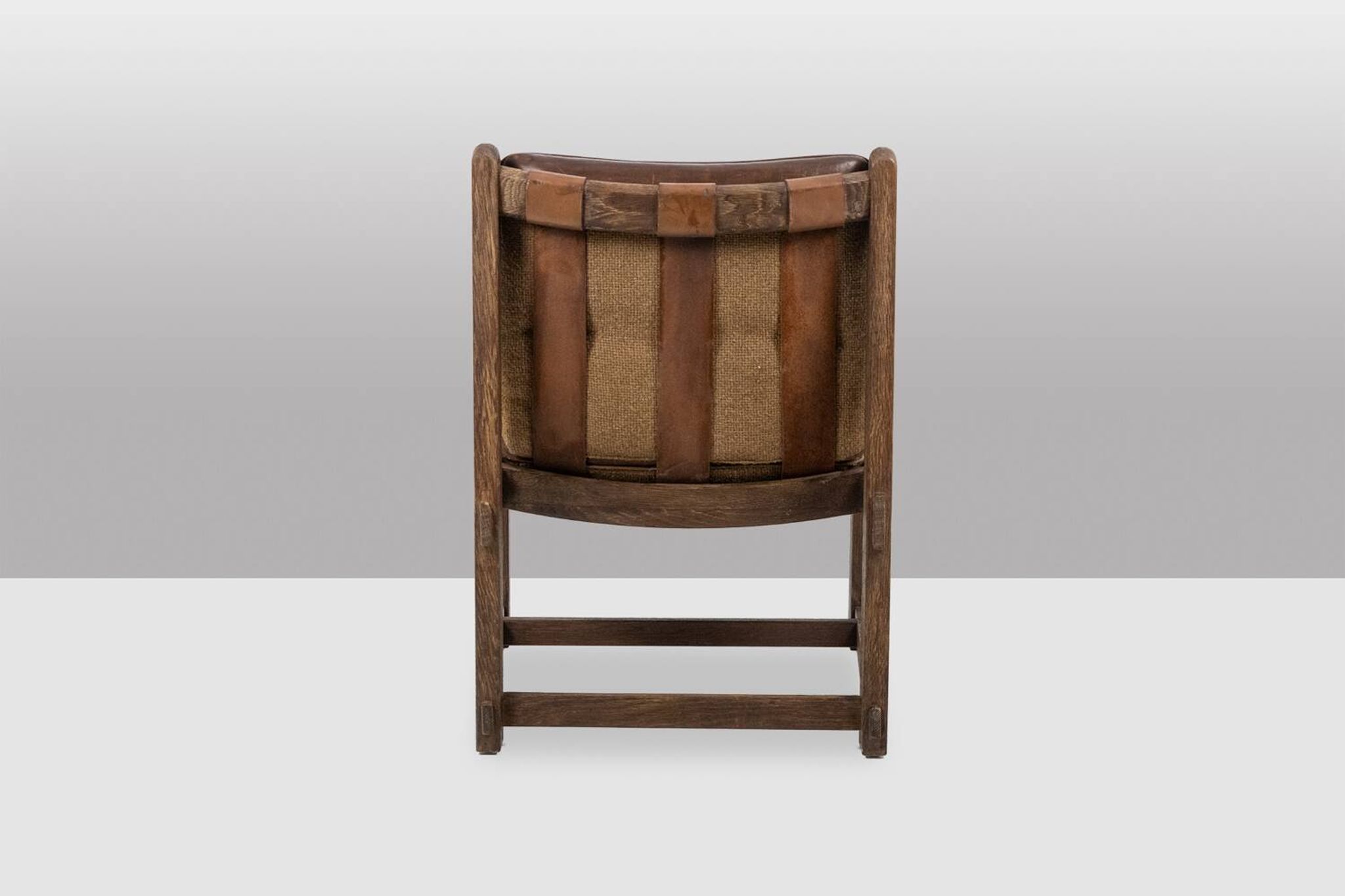 Pair of oak armchairs, upholstered in leather. Work from the 1960s.
