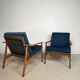 a pair of Scandinavian armchairs in teak from the 1960s