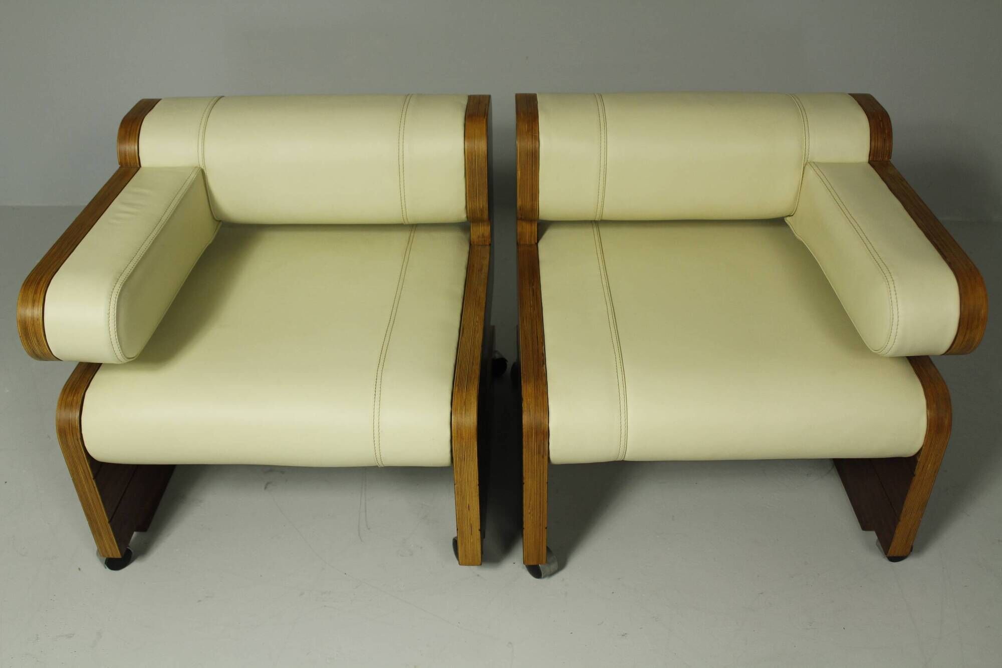 Pair of Mahogany Club Chairs upholstered in leather, 1970s