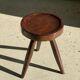 Brown solid wood stool seated circular dug