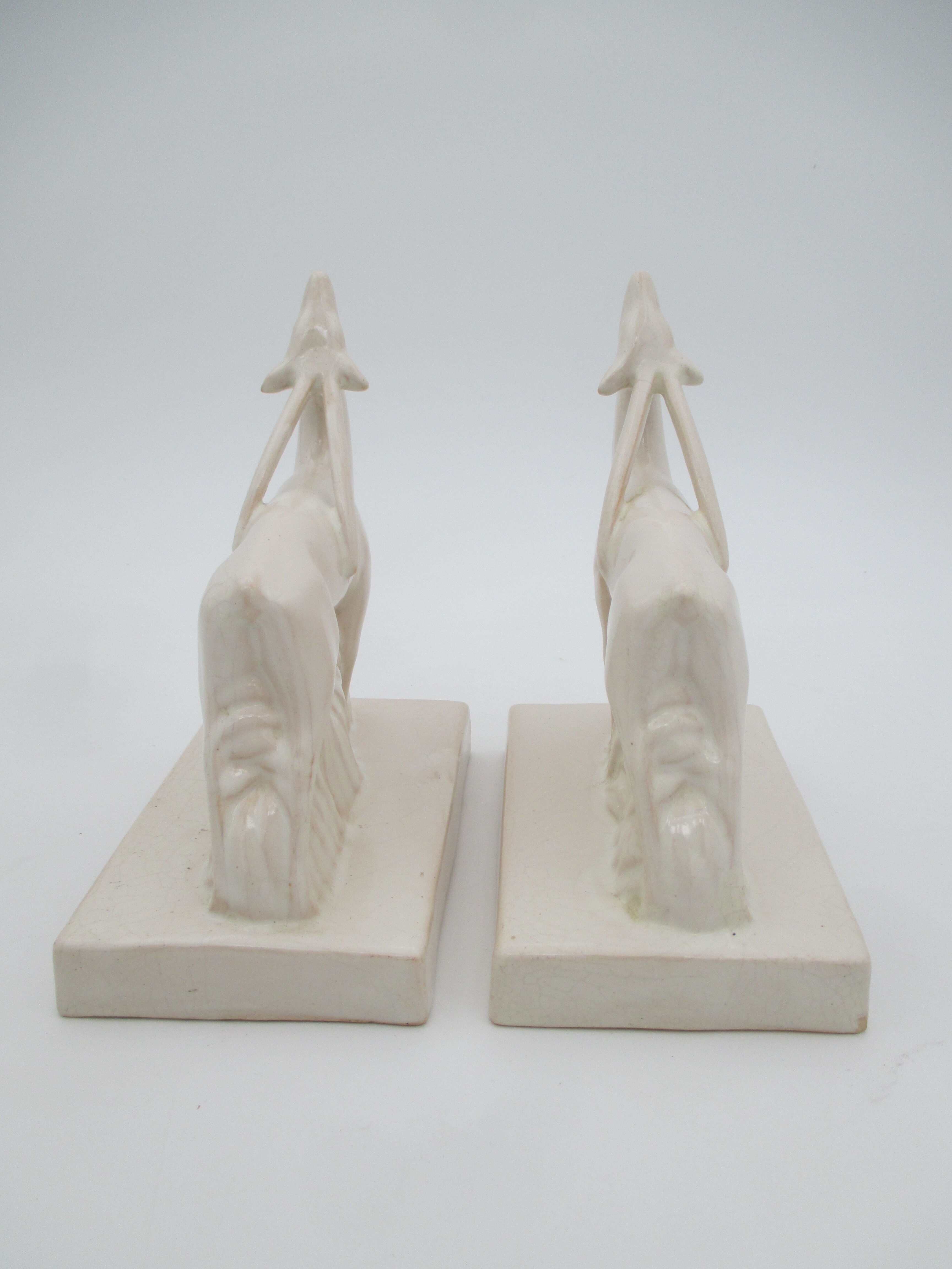 Greenhouse books ceramic cracked Antilopes signed Henri Delcourt art deco