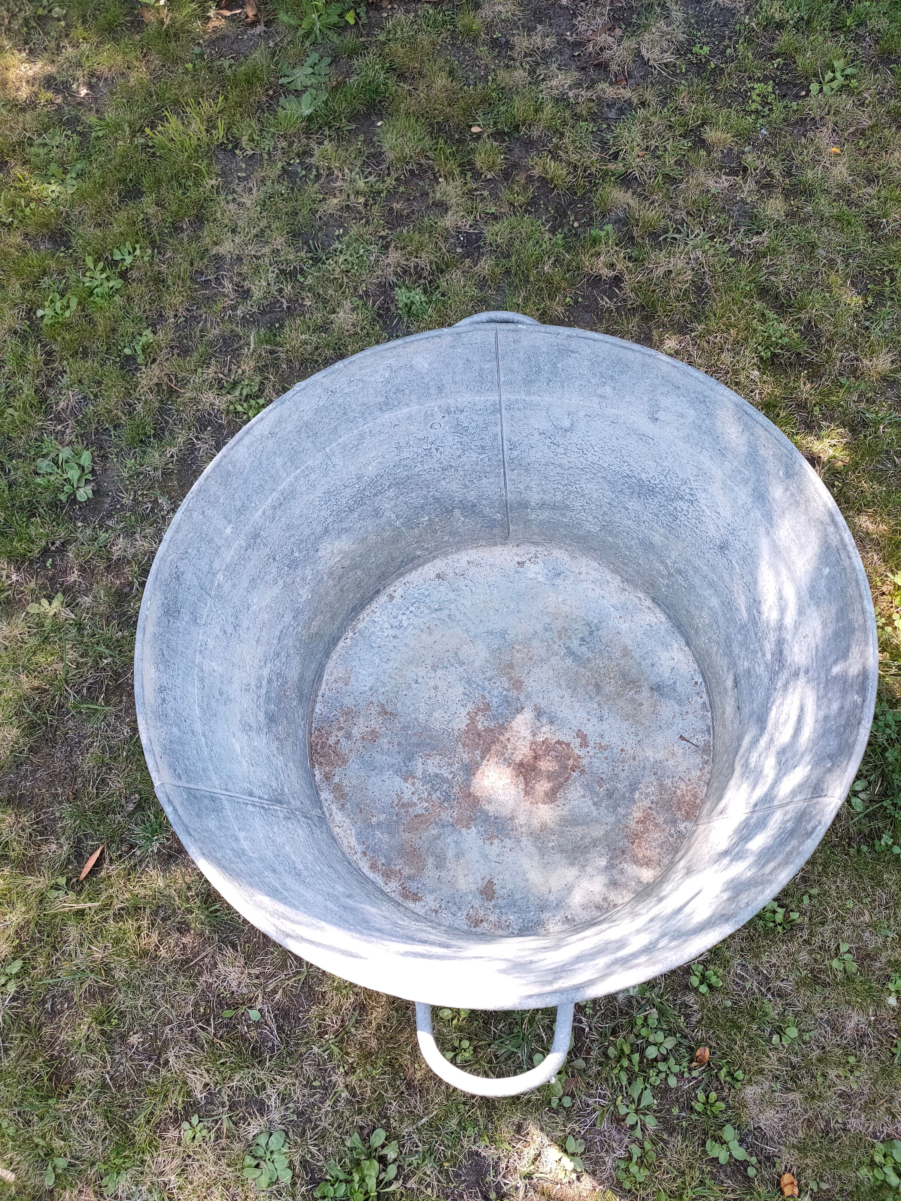 Old round zinc basin