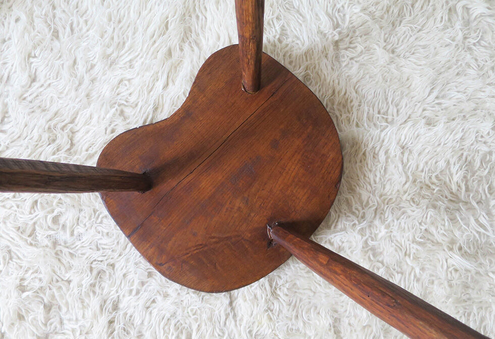 Massive wooden milking stool