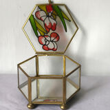 Glass box and hexagonal brass enamelled floral decoration