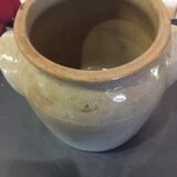 Old sandstone pot of gray color