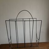 Mid-century poetic magazine rack in black metal
