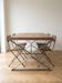 Industrial wooden dining table: spacious top and 4 matching chairs.