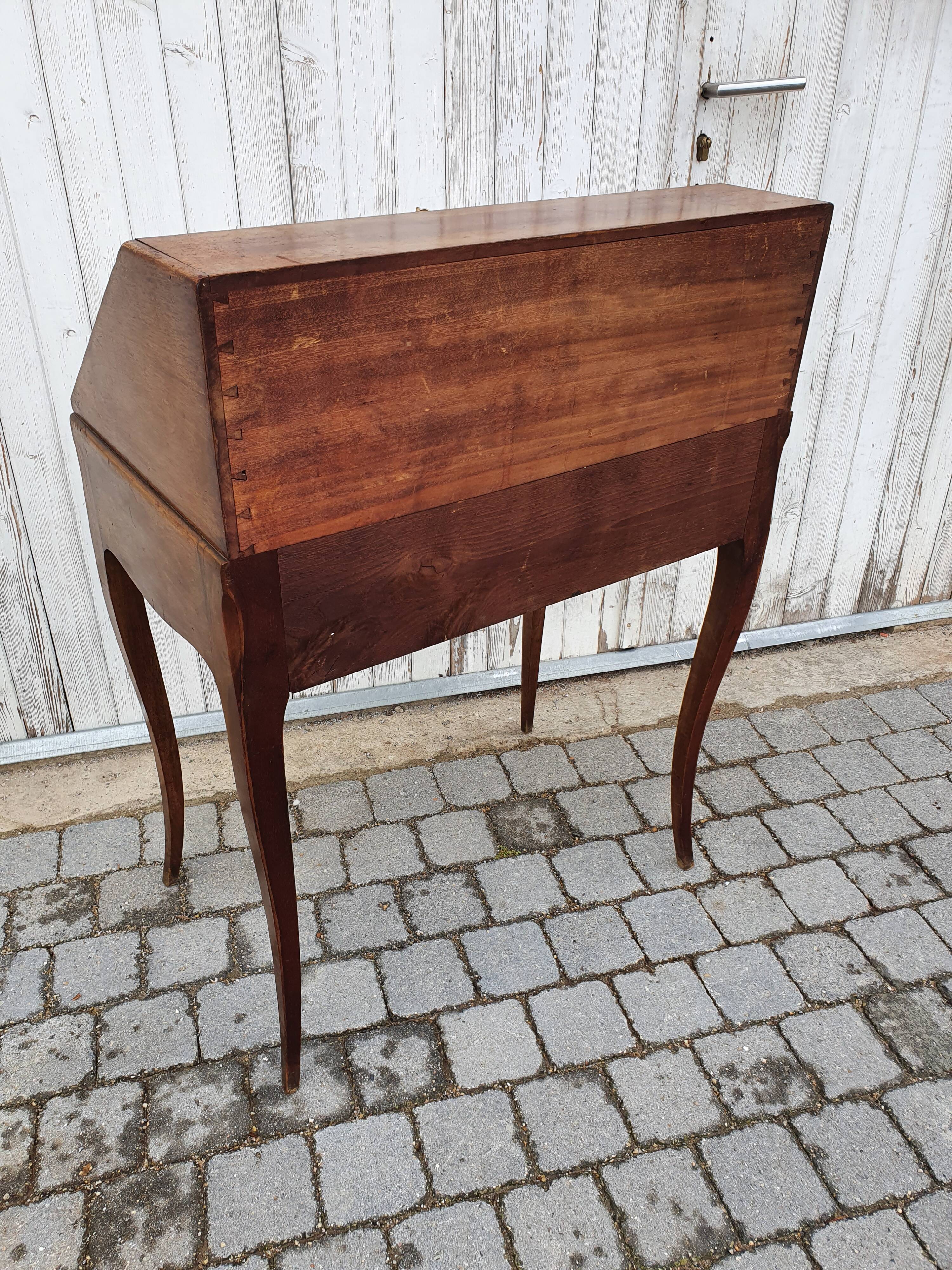 Former small secretary office with a walnut Louis XV