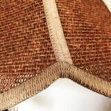 Suspension of woven fiber flowers