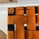 Antique turned wooden stool with woven leather.
