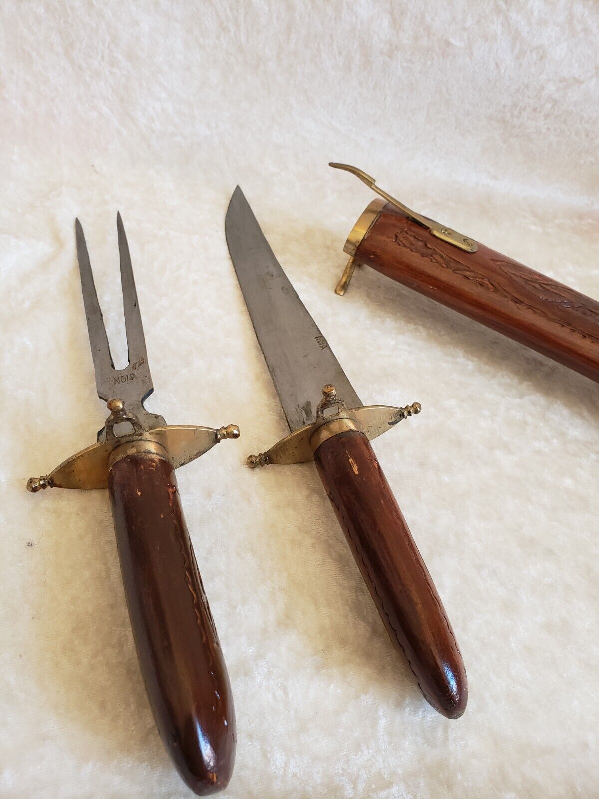 Vintage cutting service with knife and fork in wooden sheath