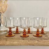 6 small amber stemmed glasses