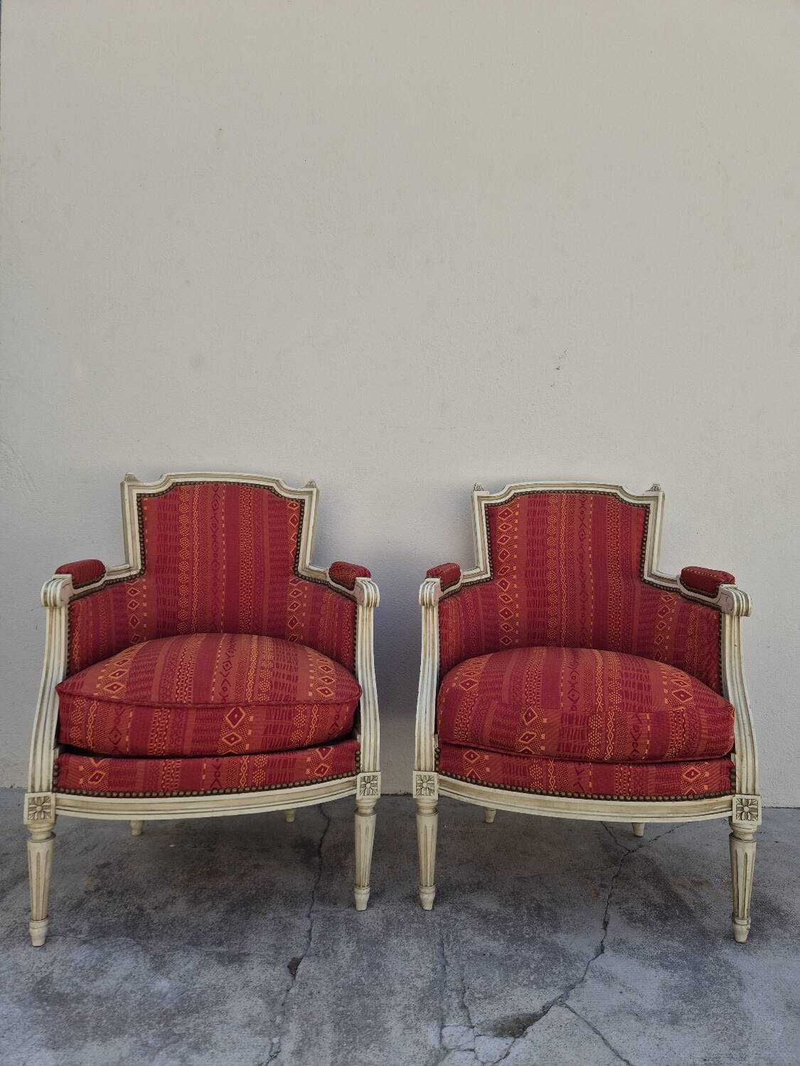 Pair of Louis XVI style bergère armchairs, antique.