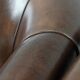 Set of two sheepskin club armchairs with fixed seat cushions