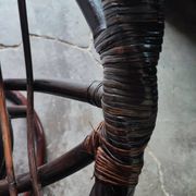 Swivel rattan love seat