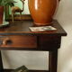 Old country side table in waxed wood