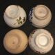 4 antique earthenware bowls with different patterns