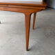 Rectangular extendable table with a Scandinavian design in solid teak.