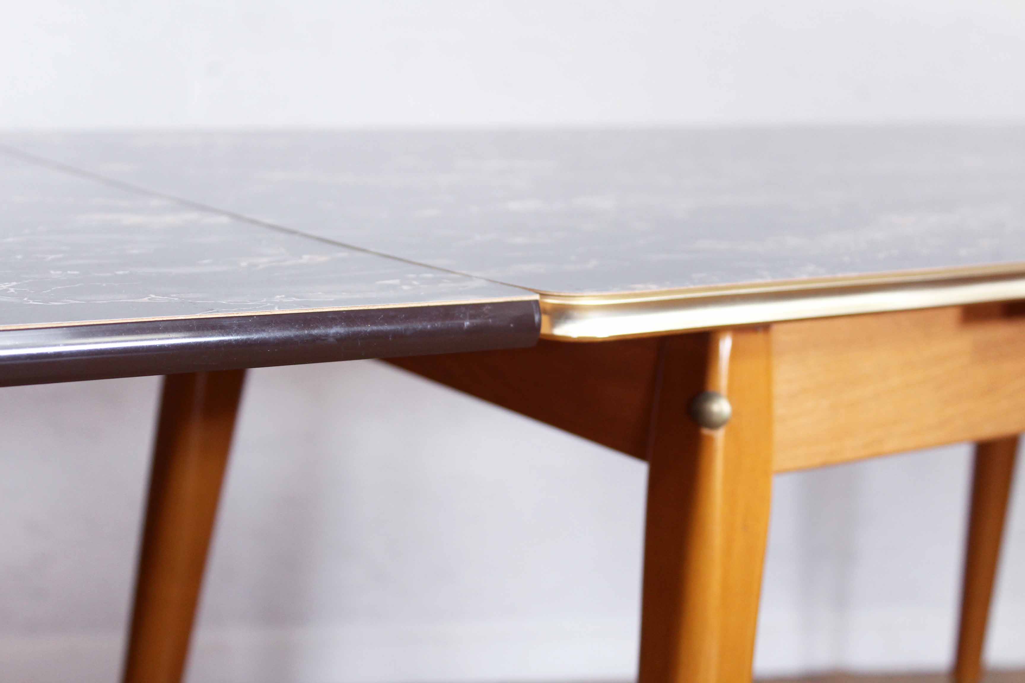 Table with compass feet from the 70s with "rise and fall" system