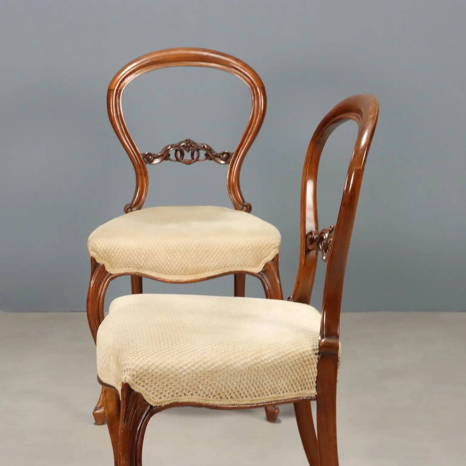 Antique walnut chairs with upholstered seats, Italy, mid-19th century.