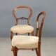 Antique walnut chairs with upholstered seats, Italy, mid-19th century.
